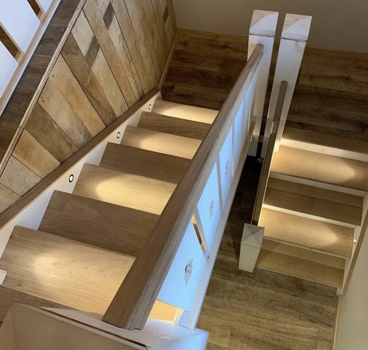 Under-stair LED lighting installation in a Surrey home
